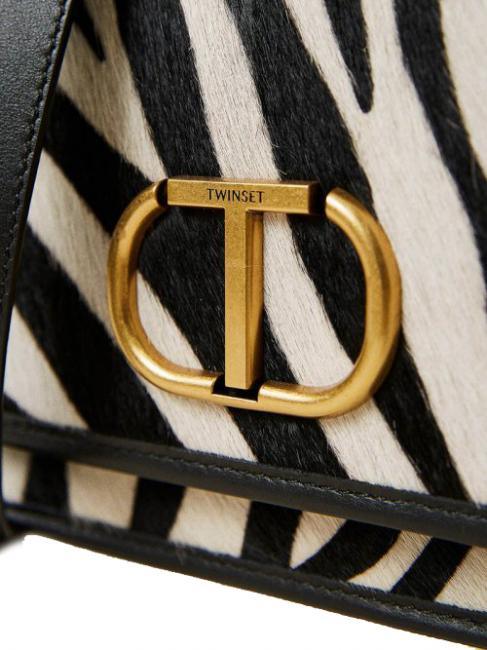 Schultertasche in Haut zebra  pelziger Zebraschnee / schwarz - Damentaschen