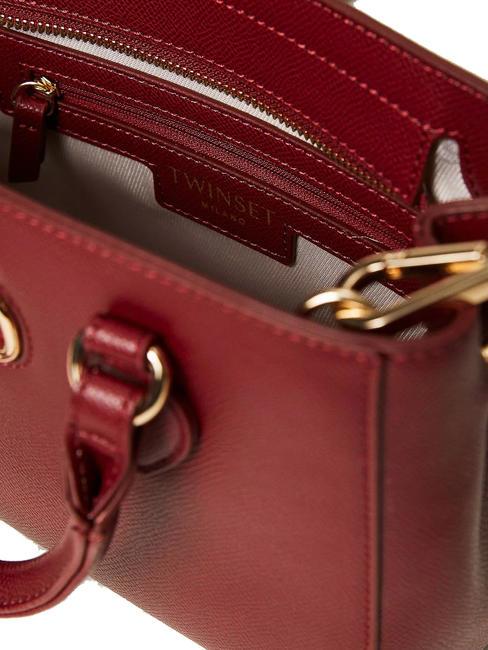 OVAL T Handtasche mit Schultergurt himbeerfarbener Glanz - Damentaschen