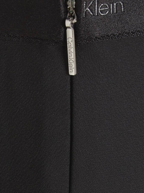 CK Gl&auml;nzender Longuette-Rock ck schwarz - Damenr&ouml;cke