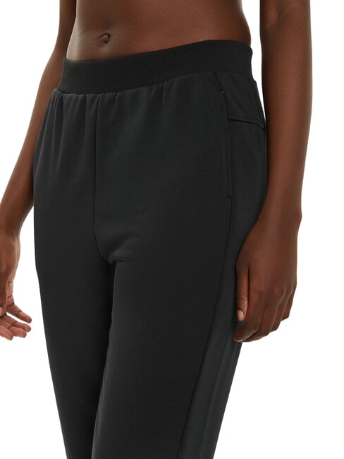 CK PERFORMANCE Elastische Trainingshose mit Kn&ouml;chelabschluss schwarze Sch&ouml;nheit - Sportanz&uuml;ge f&uuml;r Damen